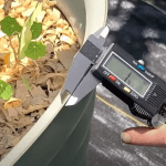 Measuring the thickness of the raised garden bed panels