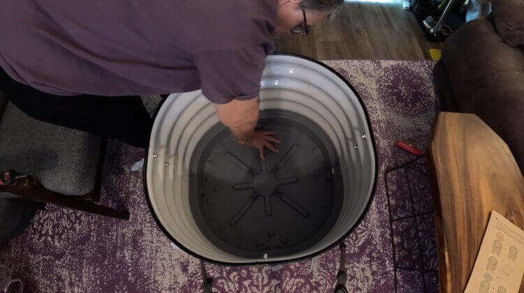 adding the wicking tray to the Vego Citrus Planter